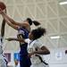 Huron and Ypsilanti High School players reach for a rebound in the game on Monday, Feb. 25. Daniel Brenner I AnnArbor.com